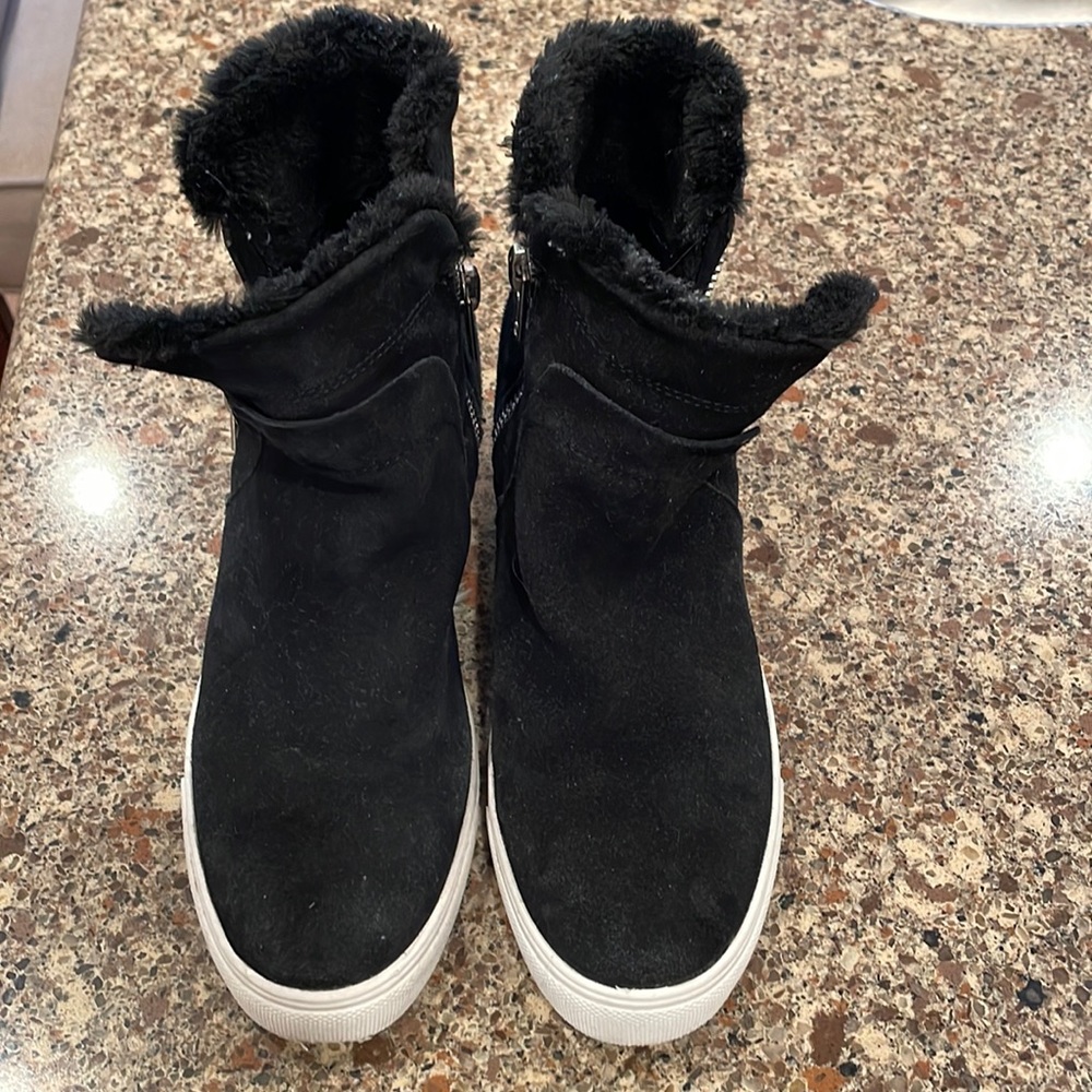Steven black boots. Size 8.5. Elevated heel inside.